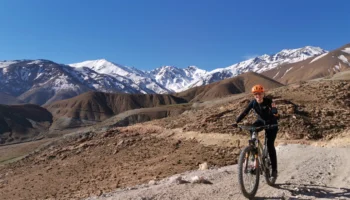 Mountains biking tour The background of the Atlas Mountains.