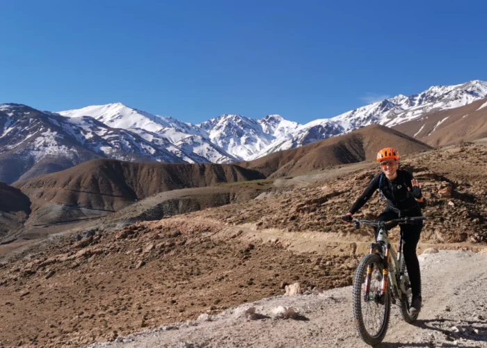 Mountains biking tour The background of the Atlas Mountains.