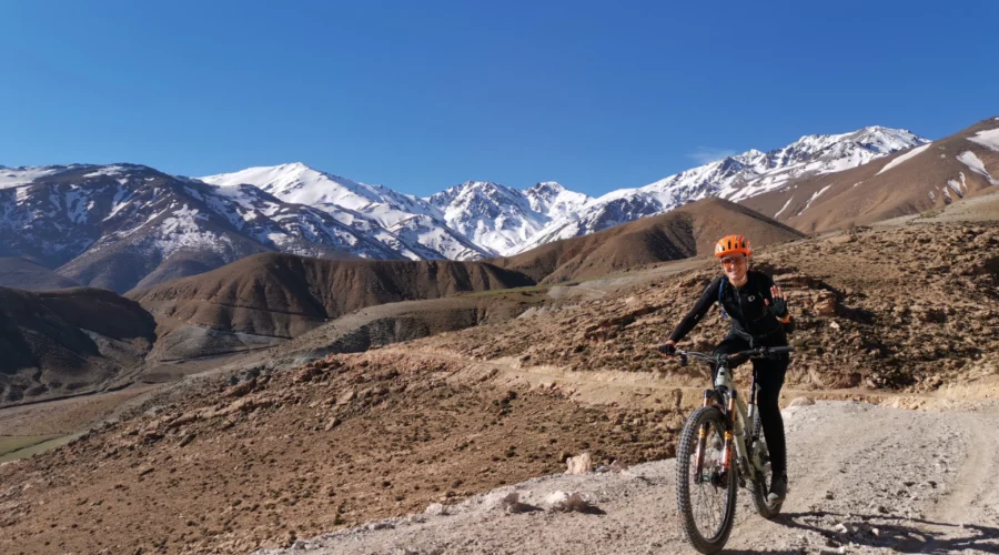 Mountains biking tour The background of the Atlas Mountains.